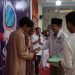 Ketua PC LDII Pancoran Mas H. Teguh Ariadi mengucapkan selamat kepada  peserta Festival Anak Sholih