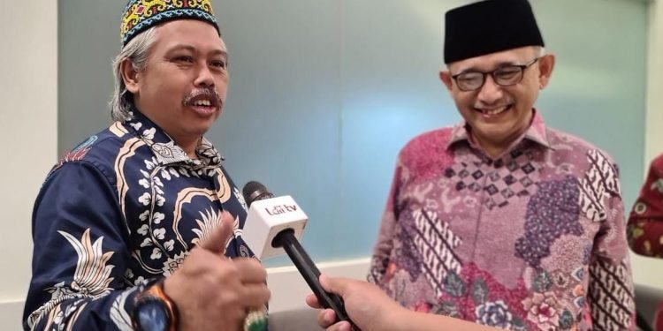 Sekjen LPOI bersama Ketum LDII. (LINES)
