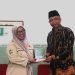 Sekretaris Kepala Bakesbangpol Kota Yogyakarta Widyastuti, S.S., M.Hum bersama , Ketua DPD LDII Kota Yogyakarta H. Herman Suherman, S.H (LINES).