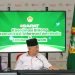 Ketua Umum DPP LDII KH Chriswanto Santoso didampingi Korbid KIM DPP LDII Rulli Kuswahyudi dan Ketua Departemen KIM DPP LDII Ludhy Cahyana saat membuka Rapat Koordinasi KIM DPP LDII pada Sabtu (23/3). Foto: LINES.