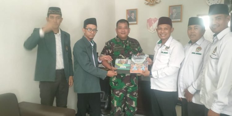 Mayor Arh. Jony Tandibura, Danramil 07/Limo saat menerima kunjungan audiensi Pengurus PC LDII Limo. (LINES)