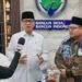 Menteri Desa Pembangunan Daerah Tertinggal, dan Transmigrasi (Mendes PDT), Yandri Susanto bersama Ketum DPP LDII Dody Taufiq Wijaya. (LINES)